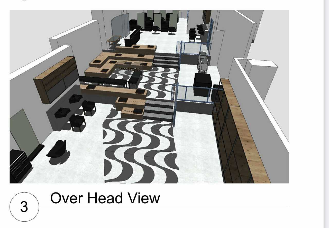 Overhead view of a modern office space with black and white wave-patterned flooring.